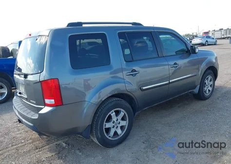 2010 Honda Pilot Touring z USA, uszkodzony, nr VIN 5FNYF3H95AB023041
